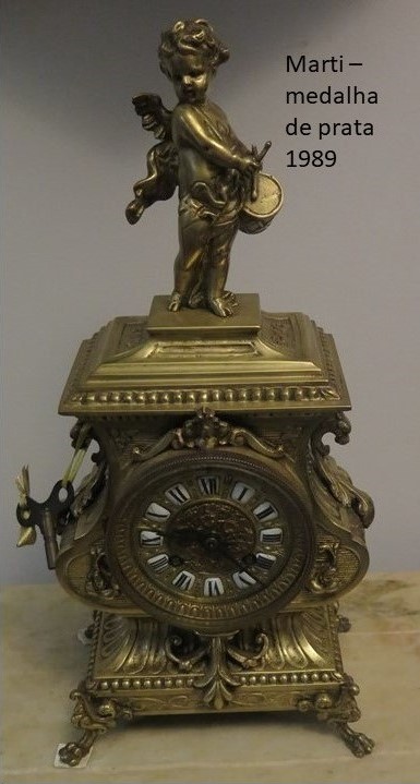 Relógio antigo de bronze maciço e formato de periscópio. - Vintage Garage -  O lugar que respeita a história das coisas